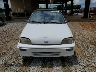 1993 Geo Metro z VIN JG1MR3362PK209644, wystawiony jako Copart lot #58749655 z przebiegiem 149 163 mil mil oraz Szkoda całkowita • Salvage title. Historia ofert i sprzedaży dostępna na DreamBid. Obrazek 5.
