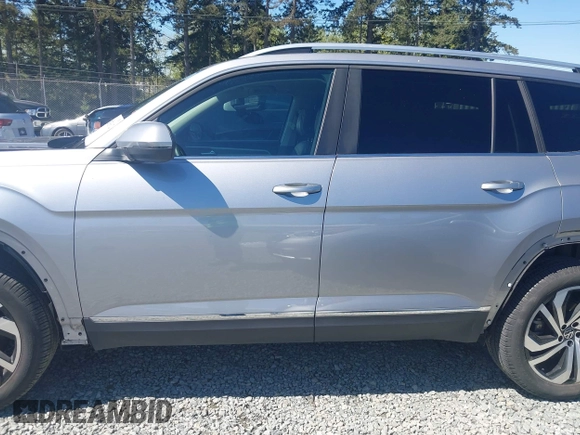 2023 Volkswagen Atlas SEL z VIN 1V2BR2CA9PC534703, wystawiony jako IAAI lot #42033612 z przebiegiem 22 886 mil mil oraz . Historia ofert i sprzedaży dostępna na DreamBid. Obrazek 15.