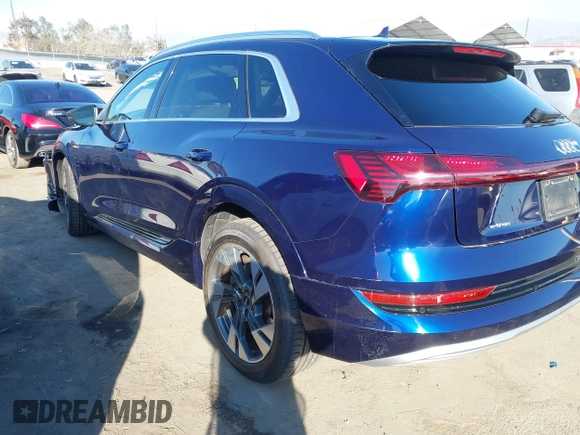 2021 Audi e-tron Premium with VIN WA1AAAGE4MB014383, listed as a IAAI auction lot 41298787 with 63,214 mi miles. Bid and sale history available at carsss.com. Image 3.