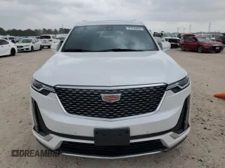 2024 Cadillac XT6 FWD Luxury with VIN 1GYKPAR47RZ720446, listed as a Copart auction lot 51762695 with 10,728 mi miles and Salvage Title. Bid and sale history available at carsss.com. Image 5.