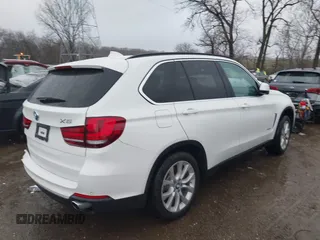 2016 BMW X5 sDrive35i with VIN 5UXKR2C56G0R69814, listed as a IAAI auction lot 41088279 with 81,219 mi miles. Bid and sale history available at carsss.com. Image 4.