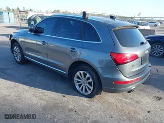 2013 Audi Q5 Premium Plus with VIN WA1LFBFP9DA046108, listed as a IAAI auction lot 41735110 with 142,410 mi miles. Bid and sale history available at carsss.com. Image 2.
