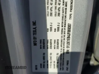 2018 Tesla Model 3 Long Range Battery z VIN 5YJ3E1EB4JF069307, wystawiony jako Copart lot #55079415 z przebiegiem 96 899 mil mil oraz Szkoda całkowita • Salvage title. Historia ofert i sprzedaży dostępna na DreamBid. Obrazek 13.