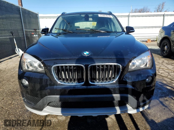 2015 BMW X1 xDrive28i with VIN WBAVL1C5XFVY31850, listed as a Copart auction lot 77491614 with 112,442 mi miles and Clean Title. Bid and sale history available at carsss.com. Image 5.