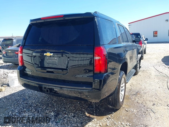 2020 Chevrolet Tahoe LS with VIN 1GNSCAKC6LR293472, listed as a IAAI auction lot 42014584 with 56,549 mi miles and . Bid and sale history available at DreamBid. Image 4.