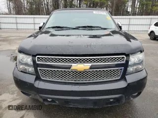 2014 Chevrolet Suburban LT with VIN 1GNSCJE05ER138819, listed as a Copart auction lot 43324175 with 218,114 mi miles and Salvage Title. Bid and sale history available at carsss.com. Image 5.