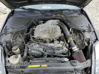 2003 Nissan 350Z Touring z VIN JN1AZ34E43T006603, wystawiony jako Copart lot #57073495 z przebiegiem 236 676 mil mil oraz Szkoda całkowita • Salvage title. Historia ofert i sprzedaży dostępna na DreamBid. Obrazek 11.