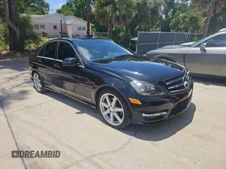 2014 Mercedes-Benz C 250 Sport with VIN WDDGF4HB3EA957269, listed as a Copart auction lot 65226545 with 100,479 mi miles and Clean title. Bid and sale history available at DreamBid. Image 1.