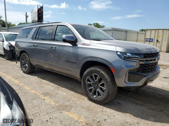 2022 Chevrolet Suburban Z71 with VIN 1GNSKDKD1NR202155, listed as a Copart auction lot 60653304 with 67,495 mi miles and Salvage Title. Bid and sale history available at carsss.com. Image 4.