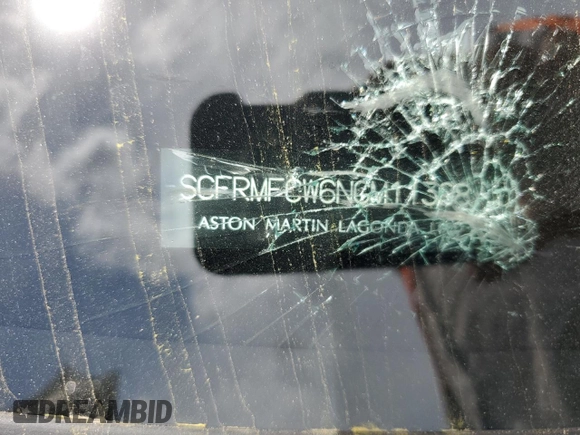 2022 Aston Martin DB11 z VIN SCFRMFCW6NGM11398, wystawiony jako Copart lot #53825715 z przebiegiem Nie podano mil oraz Szkoda całkowita • Salvage title. Historia ofert i sprzedaży dostępna na DreamBid. Obrazek 12.