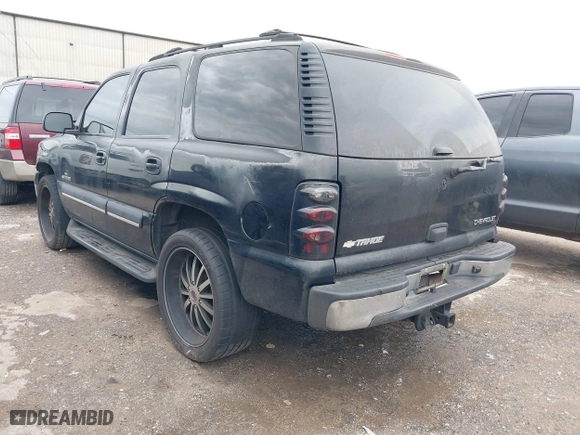 2003 Chevrolet Tahoe LT with VIN 1GNEC13Z13J297511, listed as a IAAI auction lot 41902595 with 293,195 mi miles. Bid and sale history available at carsss.com. Image 3.