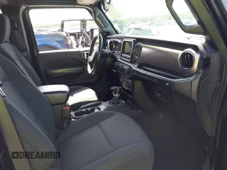 2019 Jeep Wrangler Sport S with VIN 1C4GJXAG2KW664395, listed as a IAAI auction lot 42683888 with 72,742 mi miles and . Bid and sale history available at DreamBid. Image 5.