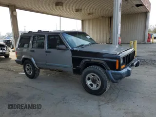 2000 Jeep Cherokee with VIN 1J4FF48S7YL221475, listed as a Copart auction lot 53005275 with 273,246 mi miles and Clean title. Bid and sale history available at DreamBid. Image 4.