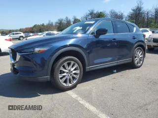 2019 Mazda CX-5 Grand Touring с VIN JM3KFBDM1K0650577, выставлен на аукционе Copart как лот 66093575 с пробегом 68 419 миль миль и Списание • Salvage title. История ставок и продаж доступна на DreamBid. Изображение 1.