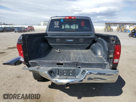 2015 Ram 1500 SLT z VIN 1C6RR6GG7FS685847, wystawiony jako Copart lot #49169675 z przebiegiem 139 408 mil mil oraz Szkoda całkowita • Salvage title. Historia ofert i sprzedaży dostępna na DreamBid. Obrazek 6.