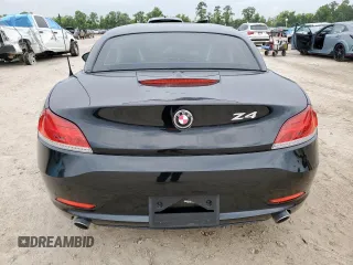 2014 BMW Z4 sDrive35i z VIN WBALM7C51EE386386, wystawiony jako Copart lot #59197195 z przebiegiem 27 975 mil mil oraz Szkoda całkowita • Salvage title. Historia ofert i sprzedaży dostępna na DreamBid. Obrazek 6.
