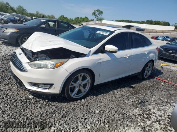 2016 Ford Focus Titanium z VIN 1FADP3J25GL201003, wystawiony jako Copart lot #53799745 z przebiegiem 194 055 mil mil oraz Szkoda całkowita • Salvage title. Historia ofert i sprzedaży dostępna na DreamBid. Obrazek 1.