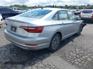 2019 Volkswagen Jetta S with VIN 3VWC57BU2KM215738, listed as a IAAI auction lot 42131376 with 52,720 mi miles and . Bid and sale history available at DreamBid. Image 4.
