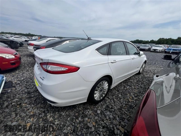 2015 Ford Fusion SE Hybrid с VIN 3FA6P0LU2FR120126, выставлен на аукционе Copart как лот 57130185 с пробегом 55 792 миль миль и Чистый • Clean title. История ставок и продаж доступна на DreamBid. Изображение 3.