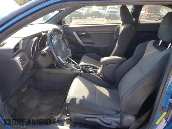 2016 Scion tC z VIN JTKJF5C75GJ022534, wystawiony jako Copart lot #52254005 z przebiegiem 103 812 mil mil oraz Szkoda całkowita • Salvage title. Historia ofert i sprzedaży dostępna na DreamBid. Obrazek 7.
