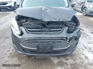 2016 Ford C-Max Hybrid SE with VIN 1FADP5AU4GL100578, listed as a IAAI auction lot 41541249 with 243,956 mi miles. Bid and sale history available at carsss.com. Image 6.