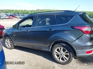 2017 Ford Escape SE z VIN 1FMCU0GDXHUB66813, wystawiony jako IAAI lot #42056150 z przebiegiem 86 915 mil mil oraz . Historia ofert i sprzedaży dostępna na DreamBid. Obrazek 14.