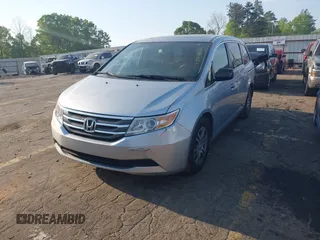 2013 Honda Odyssey EX-L with VIN 5FNRL5H6XDB084016, listed as a IAAI auction lot 42044300 with 156,296 mi miles and . Bid and sale history available at carsss.com. Image 2.
