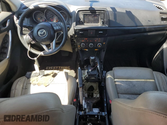 2014 Mazda CX-5 Grand Touring with VIN JM3KE4DY6E0363211, listed as a Copart auction lot 48352315 with 214,298 mi miles and Salvage Title. Bid and sale history available at DreamBid. Image 8.