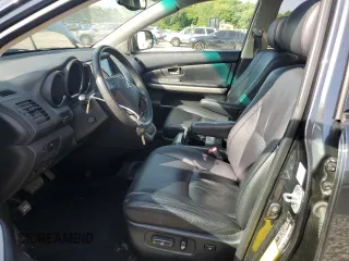 2006 Lexus RX 400h with VIN JTJHW31U562003894, listed as a Copart auction lot 56335235 with 92,397 mi miles and Salvage title. Bid and sale history available at DreamBid. Image 7.