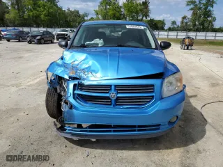 2009 Dodge Caliber SXT with VIN 1B3HB48A59D164675, listed as a Copart auction lot 51084975 with 115,330 mi miles and Salvage Title. Bid and sale history available at carsss.com. Image 5.