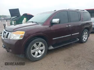 2014 Nissan Armada SL z VIN 5N1BA0NC8EN601509, wystawiony jako IAAI lot #42420782 z przebiegiem 131 717 mil mil oraz . Historia ofert i sprzedaży dostępna na DreamBid. Obrazek 2.