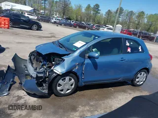 2010 Toyota Yaris with VIN JTDJT4K36A5285298, listed as a IAAI auction lot 42003609 with 158,418 mi miles. Bid and sale history available at carsss.com. Image 14.