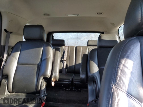 2012 GMC Yukon SLT with VIN 1GKS2CE05CR103674, listed as a Copart auction lot 50557275 with 206,664 mi miles and Salvage Title. Bid and sale history available at carsss.com. Image 10.