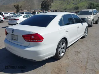 2012 Volkswagen Passat SE with VIN 1VWBP7A3XCC109832, listed as a IAAI auction lot 41657750 with 192,653 mi miles. Bid and sale history available at carsss.com. Image 4.