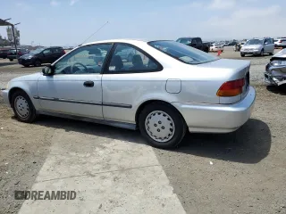 1997 Honda Civic DX with VIN 1HGEJ6128VL021000, listed as a Copart auction lot 56716604 with 152,654 mi miles and Salvage Title. Bid and sale history available at carsss.com. Image 2.