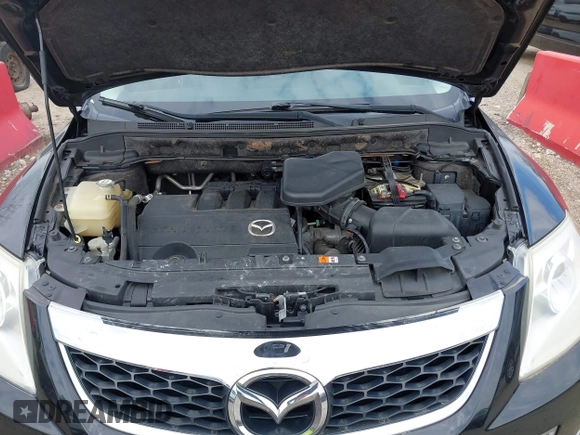 2012 Mazda CX-9 Grand Touring with VIN JM3TB3DV2C0335030, listed as a IAAI auction lot 41909217 with 126,714 mi miles. Bid and sale history available at carsss.com. Image 10.