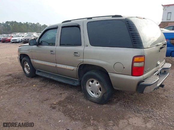 2003 GMC Yukon SLT with VIN 1GKEC13Z33R161136, listed as a IAAI auction lot 41907443 with 325,842 mi miles. Bid and sale history available at carsss.com. Image 3.