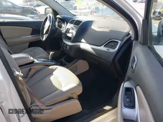 2012 Dodge Journey SXT z VIN 3C4PDCBG7CT374496, wystawiony jako IAAI lot #42317000 z przebiegiem 149 029 mil mil oraz . Historia ofert i sprzedaży dostępna na DreamBid. Obrazek 5.