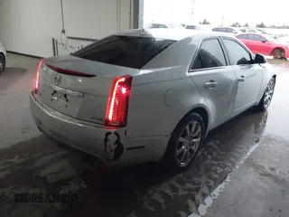 2009 Cadillac CTS RWD w/1SB with VIN 1G6DV57V090157738, listed as a IAAI auction lot 41180254 with 129,361 mi miles. Bid and sale history available at carsss.com. Image 4.