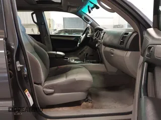 2005 Toyota 4Runner SR5 with VIN JTEBT14R158023791, listed as a IAAI auction lot 42011427 with 142,289 mi miles and . Bid and sale history available at DreamBid. Image 5.