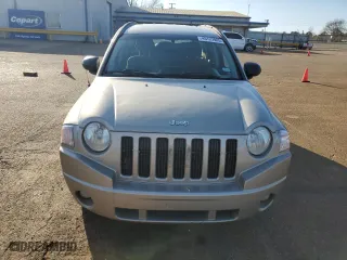 2010 Jeep Compass North Edition with VIN 1J4NT4FB5AD570092, listed as a Copart auction lot 45122905 with 262,800 mi miles and Salvage Title. Bid and sale history available at carsss.com. Image 5.