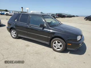 1997 Volkswagen Golf z VIN 3VWLB81H1VM098970, wystawiony jako Copart lot #52580705 z przebiegiem 193 509 mil mil oraz Czysty tytuł • Clean title. Historia ofert i sprzedaży dostępna na DreamBid. Obrazek 4.