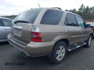 2004 Acura MDX Touring Pkg RES w/Nav with VIN 2HNYD18954H546286, listed as a IAAI auction lot 42009606 with 198,037 mi miles. Bid and sale history available at carsss.com. Image 4.