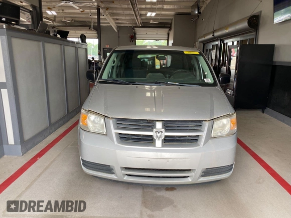 2010 Dodge Grand Caravan SE z VIN 2D4RN4DEXAR412152, wystawiony jako IAAI lot #42825395 z przebiegiem 93 398 mil mil oraz . Historia ofert i sprzedaży dostępna na DreamBid. Obrazek 2.
