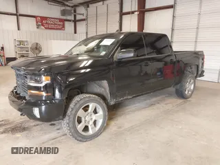 2017 Chevrolet Silverado 1500 LT with VIN 3GCUKREC6HG501307, listed as a IAAI auction lot 41611899 with 133,863 mi miles and . Bid and sale history available at DreamBid. Image 2.