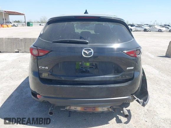 2018 Mazda CX-5 Grand Touring with VIN JM3KFADM8J0330035, listed as a IAAI auction lot 41878680 with 62,632 mi miles. Bid and sale history available at carsss.com. Image 17.