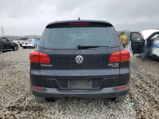 2015 Volkswagen Tiguan SE z VIN WVGBV7AXXFW606017, wystawiony jako Copart lot #51005745 z przebiegiem Nie podano mil oraz Szkoda całkowita • Salvage title. Historia ofert i sprzedaży dostępna na DreamBid. Obrazek 6.