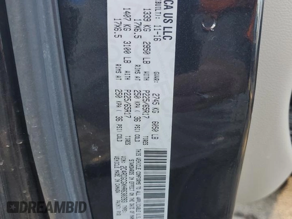 2017 Dodge Grand Caravan SXT with VIN 2C4RDGCGXHR630283, listed as a Copart auction lot 52793665 with 157,673 mi miles and Salvage Title. Bid and sale history available at DreamBid. Image 15.