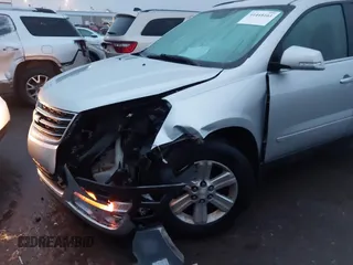 2013 Chevrolet Traverse LT with VIN 1GNKVGKD9DJ265459, listed as a IAAI auction lot 41448161 with 170,527 mi miles and . Bid and sale history available at DreamBid. Image 6.