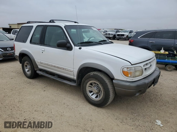 1999 Ford Explorer with VIN 1FMYU22E1XUA94061, listed as a Copart auction lot 44463165 with 172,246 mi miles and Salvage title. Bid and sale history available at DreamBid. Image 4.